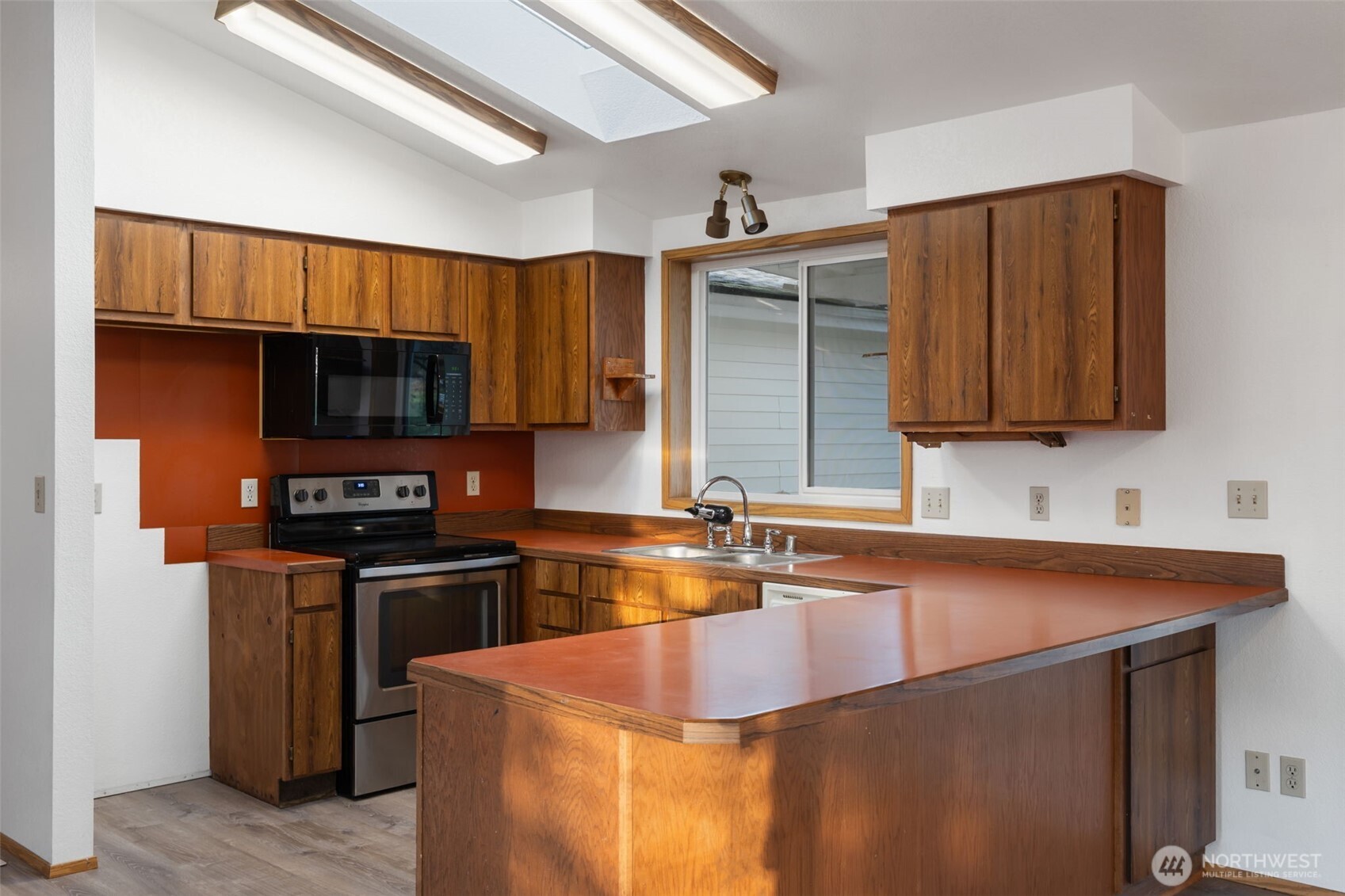 568 A Cemetery Road Winlock, WA 98596 - Photo 13 of 38 a kitchen that has a sink and a stove top oven