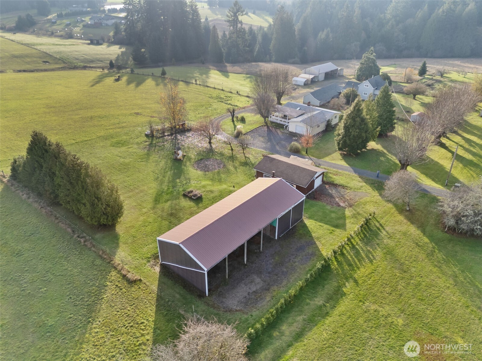 568 A Cemetery Road Winlock, WA 98596 - Photo 29 of 38 a view of a swimming pool with lawn chairs