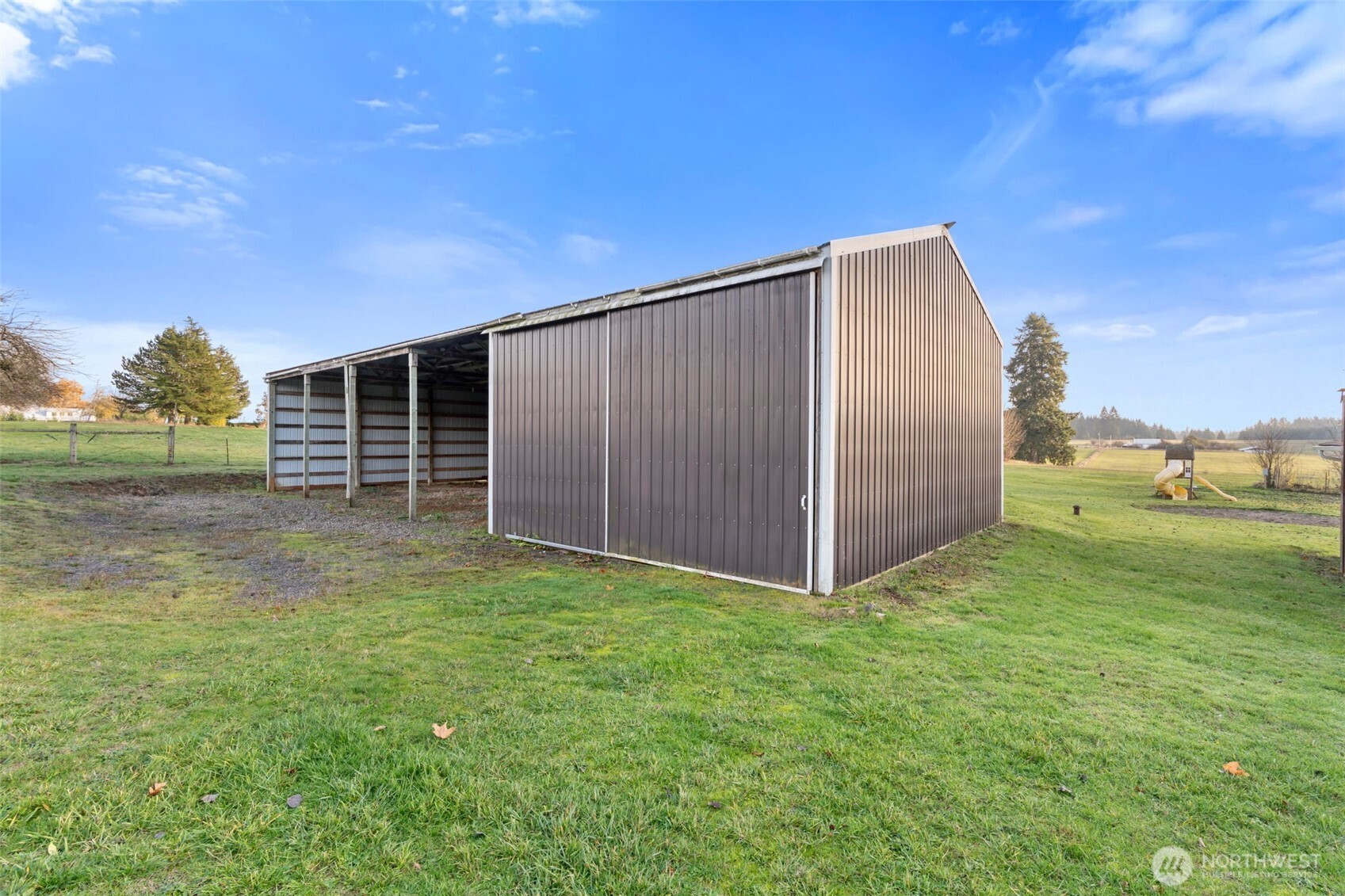 568 A Cemetery Road Winlock, WA 98596 - Photo 30 of 38 a view of a backyard with wooden fence