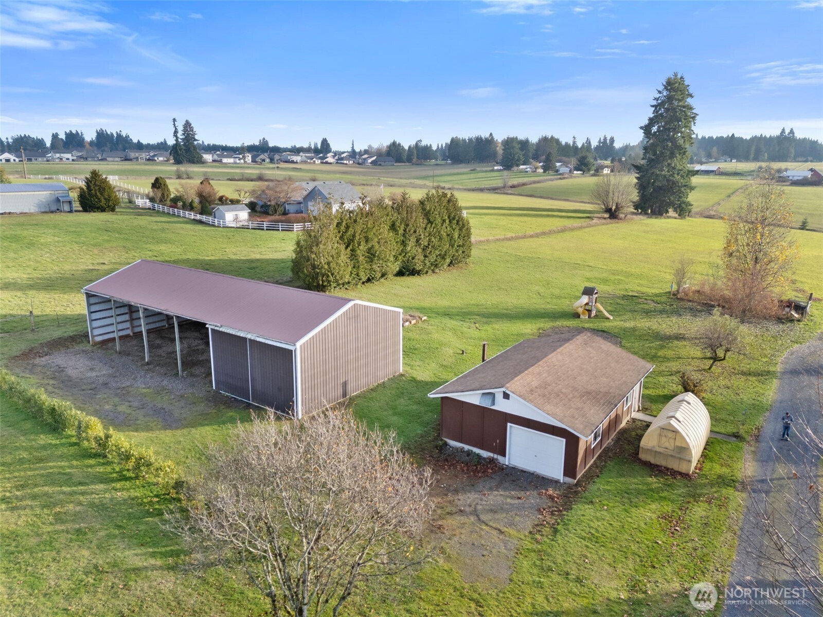 568 A Cemetery Road Winlock, WA 98596 - Photo 4 of 38 an aerial view of a house with outdoor space and lake view