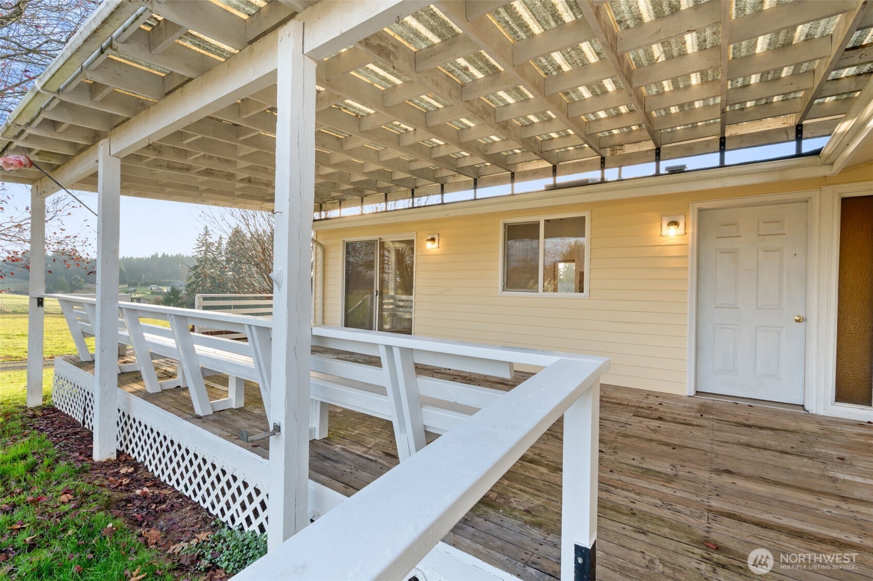 568 A Cemetery Road Winlock, WA 98596 - Photo 8 of 38 a view of balcony with wooden floor and fence