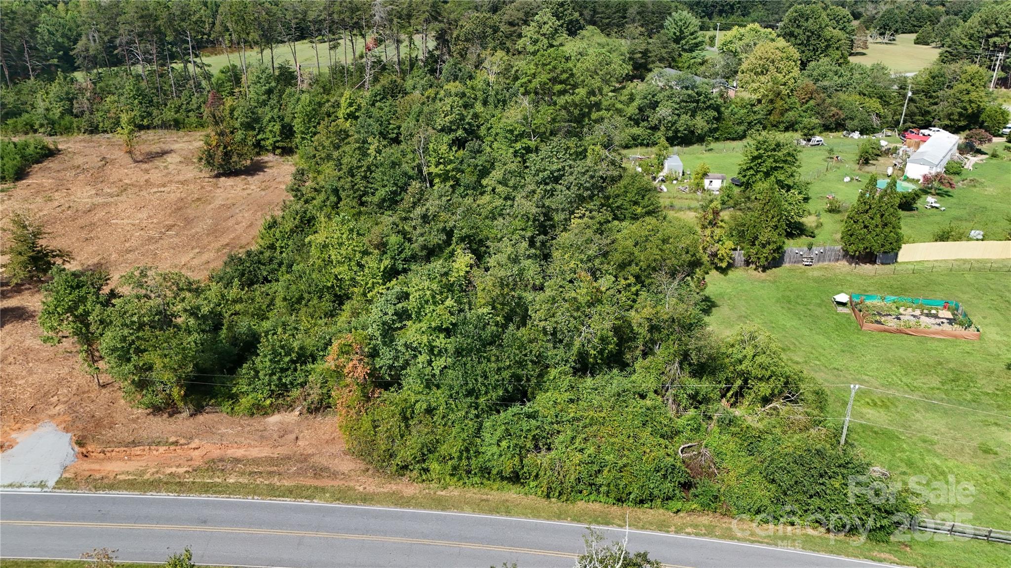 Lot 1 Poors Ford Road, Unit 1 Tryon, NC 28782 - Photo 23 of 23 an aerial view of a house with a yard