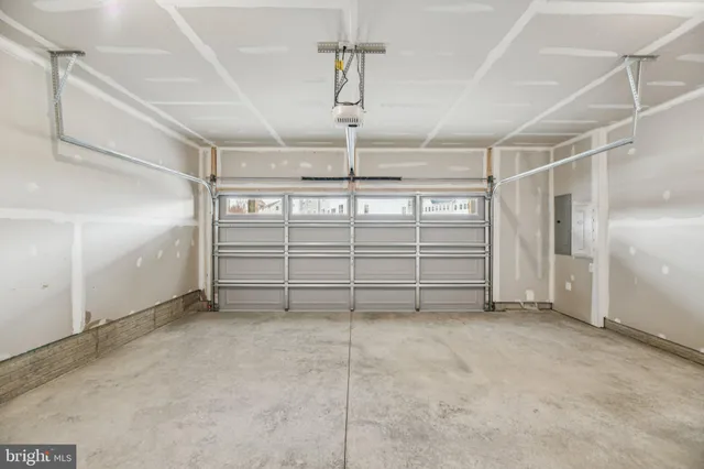 a view of an empty room with racks on the wall