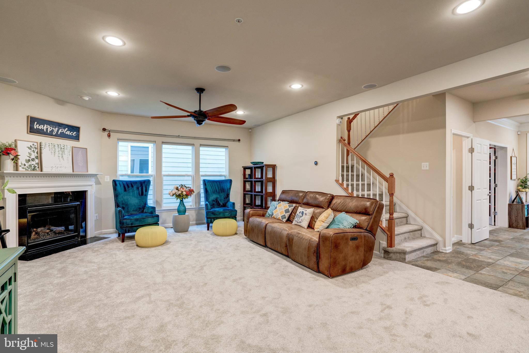 11516 Amherst Avenue Silver Spring, MD 20902 - Photo 12 of 38 Cozy and spacious living room with fireplace