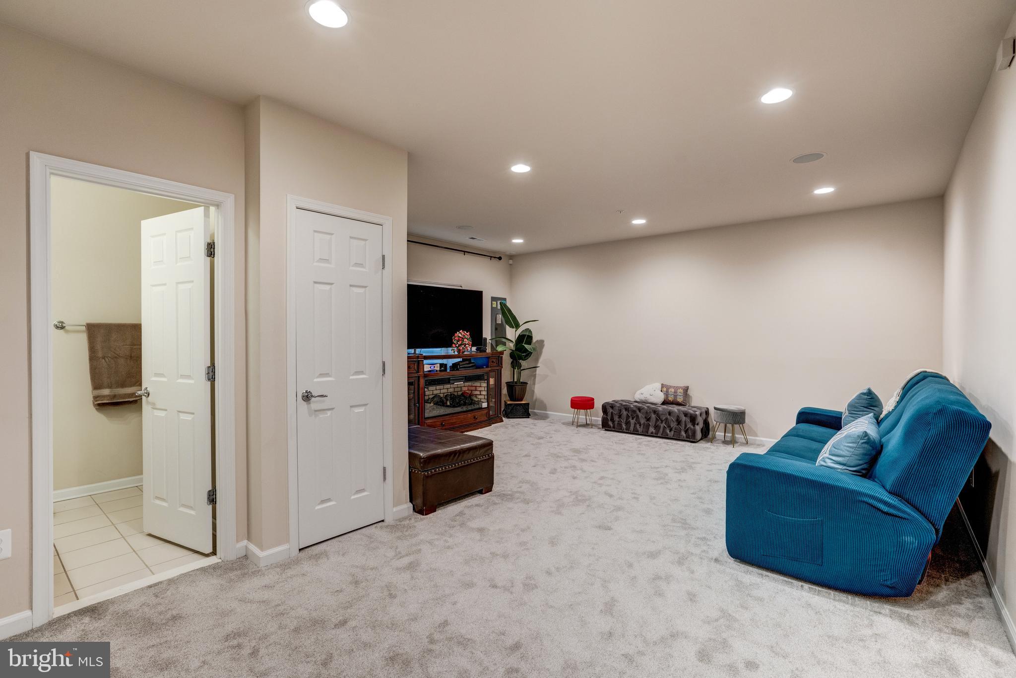 11516 Amherst Avenue Silver Spring, MD 20902 - Photo 33 of 38 Large and spacious rec room with lots of lighting