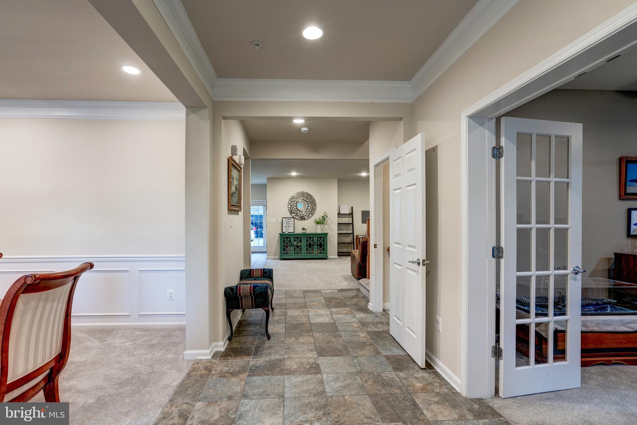 11516 Amherst Avenue Silver Spring, MD 20902 - Photo 7 of 38 Front hallway welcomes into the living space