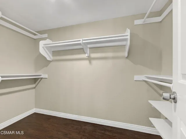 a view of an empty walk in closet