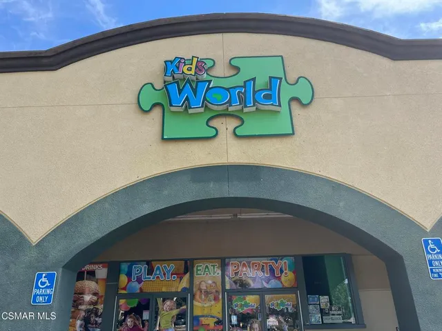 a sign on the side of the road