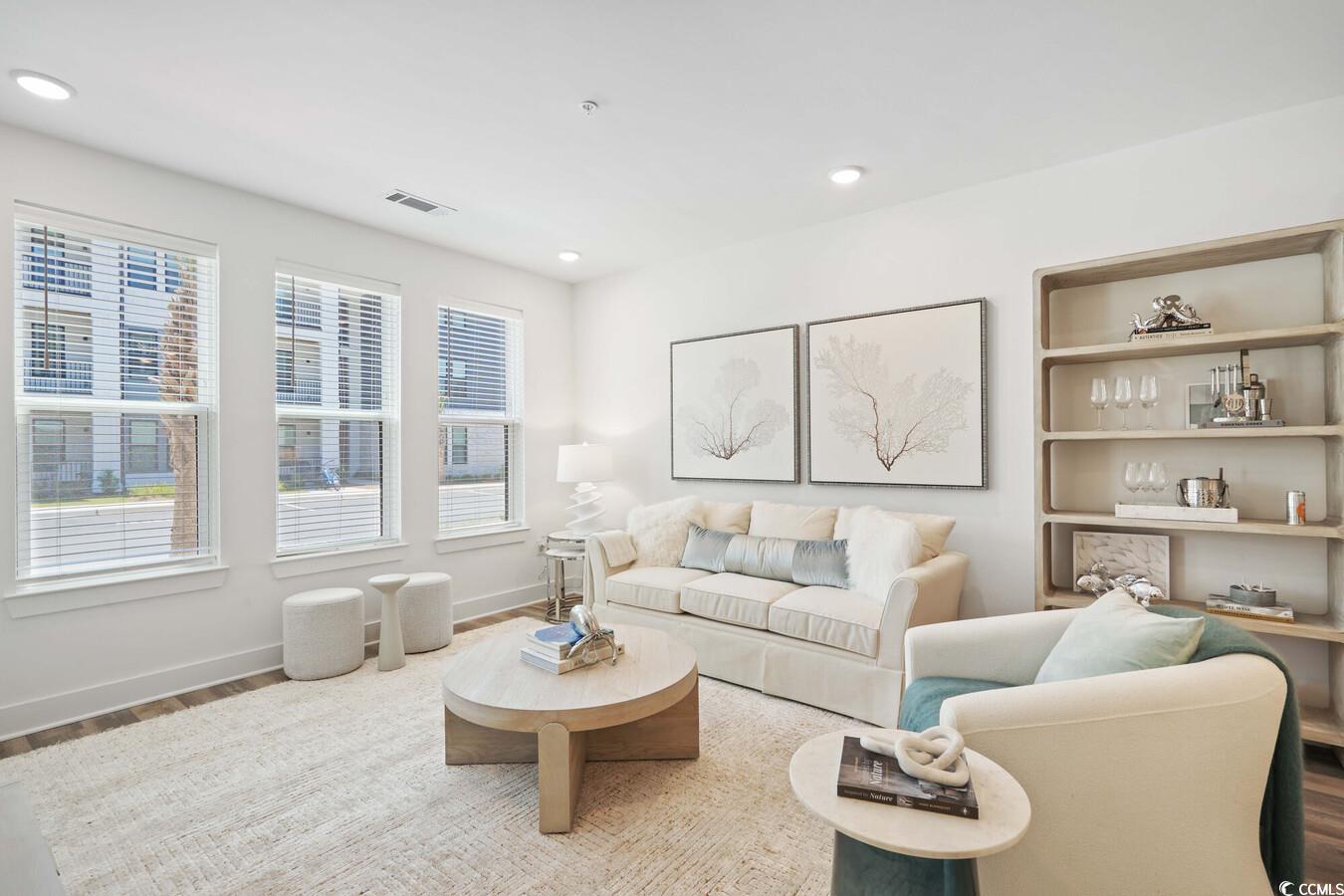 331 Pickwick Drive, Unit A2 Myrtle Beach, SC 29588 - Photo 13 of 39 Living room with wood-type flooring