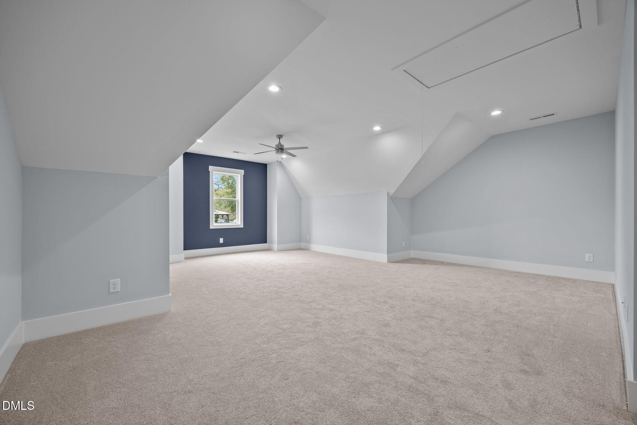 10 Carnation Road Youngsville, NC 27596 - Photo 30 of 47 an empty room with a windows and a fireplace