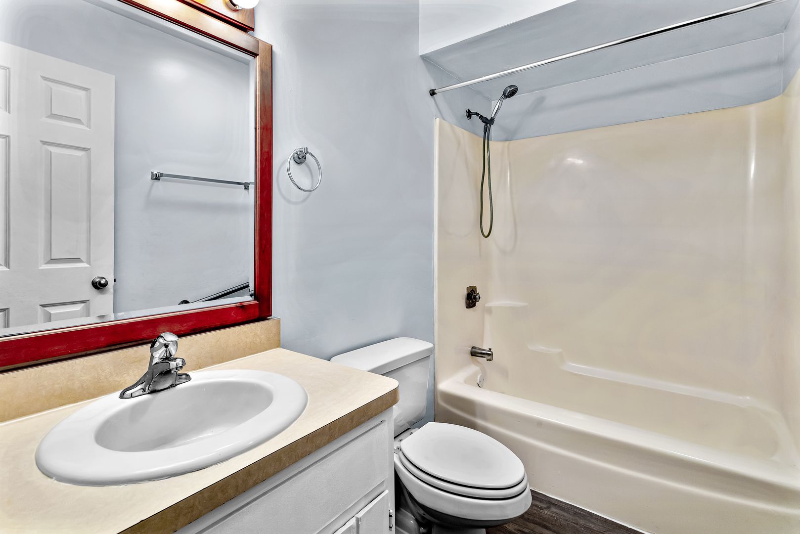216 Madison Street, Unit 1A Joliet, IL 60435 - Photo 10 of 13 a bathroom with a sink toilet and shower