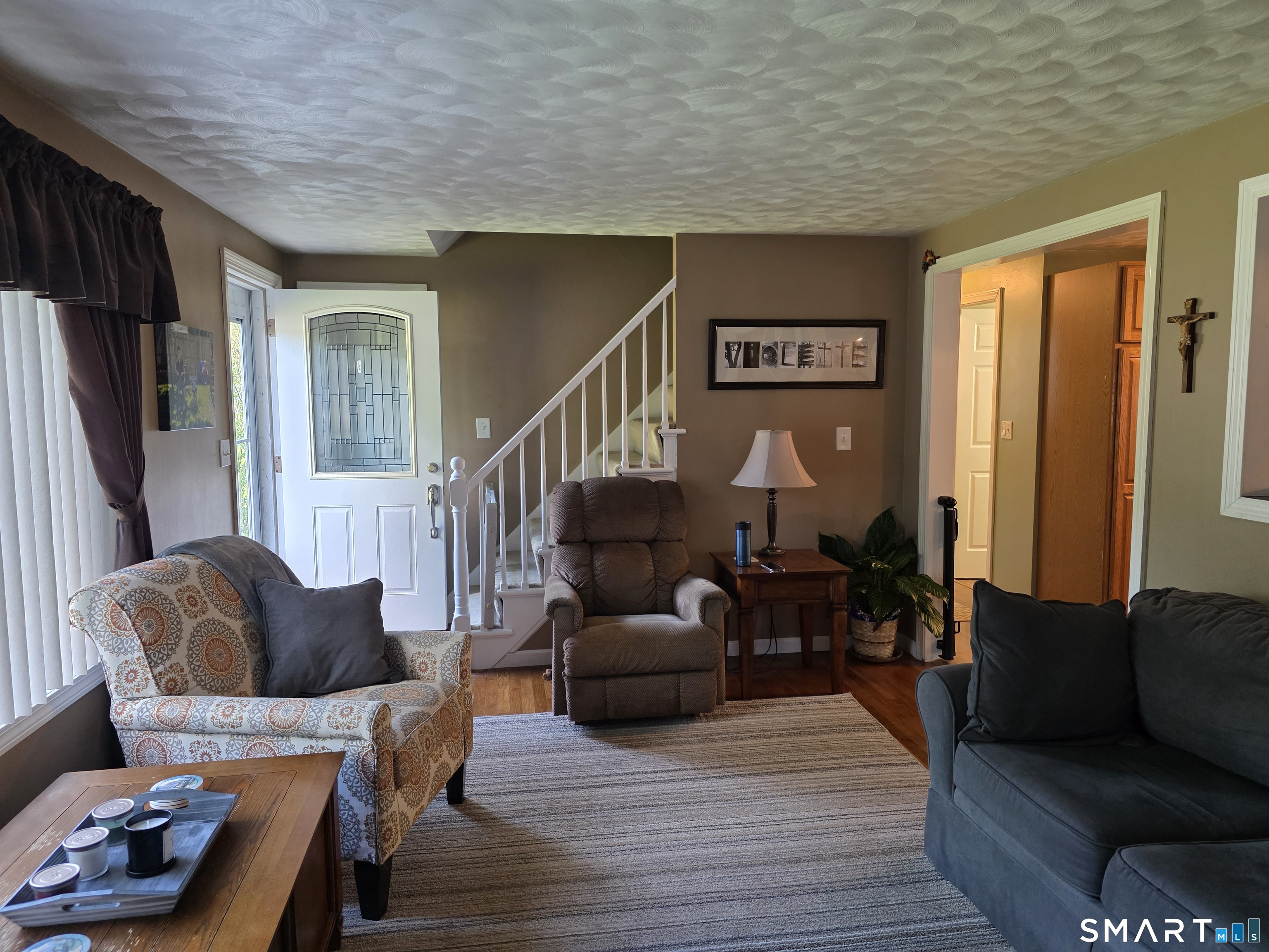 15 Van Buren Road Enfield, CT 06082 - Photo 18 of 40 a living room with furniture and wooden floor