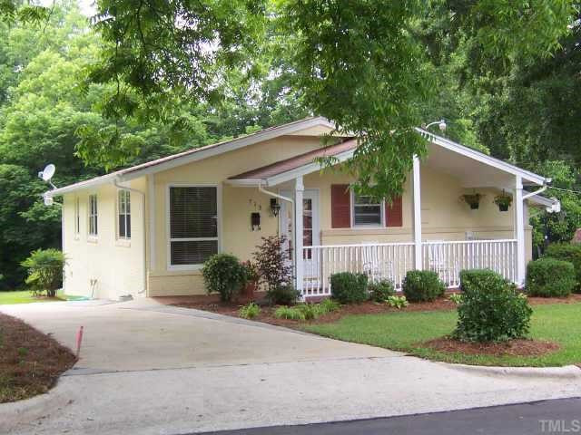 713 Tower Street Raleigh, NC 27607 - Photo 1 of 1 a front view of a house with garden