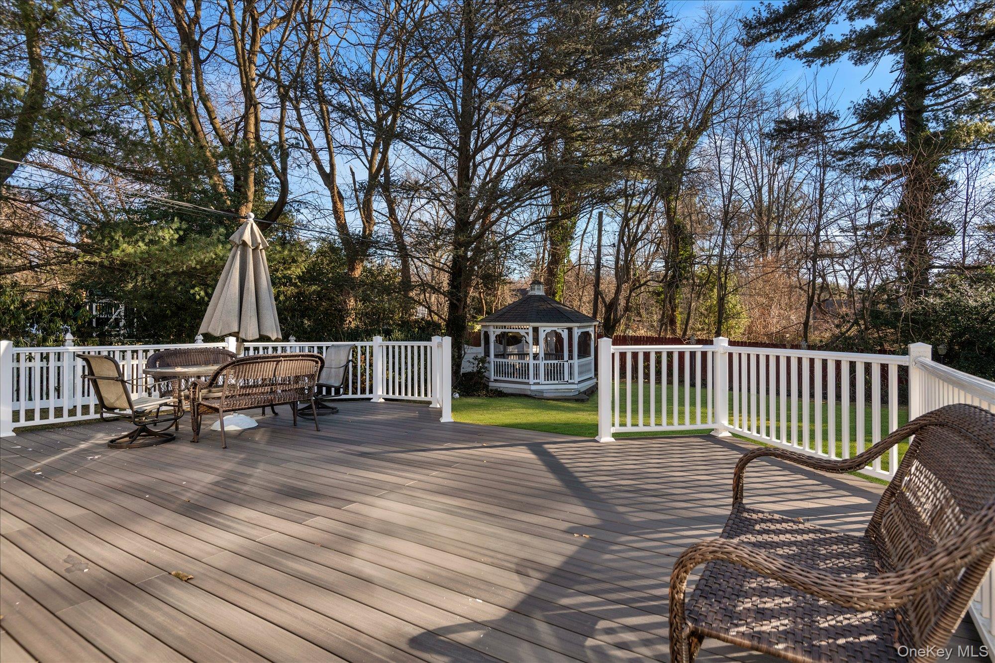 200 Hummingbird Drive East Hills, NY 11576 - Photo 25 of 29 a view of a roof deck with wooden fence and floor