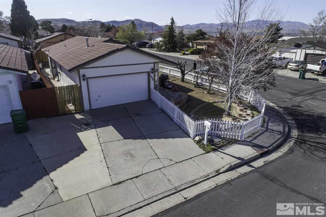 6960 Flower Street Reno, NV 89506 - Photo 1 of 1 a view of a house with a patio