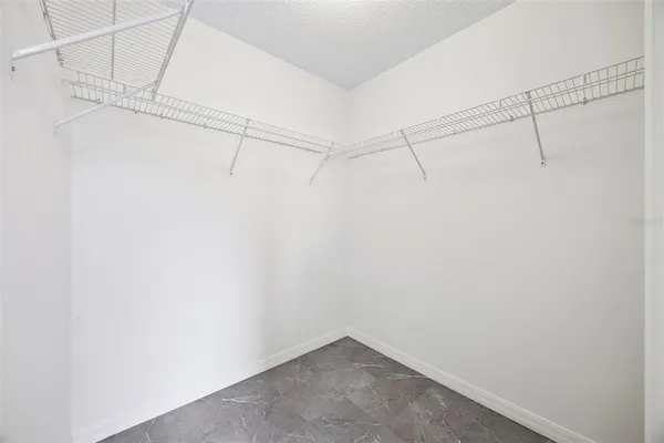 a view of a room with racks on the wall