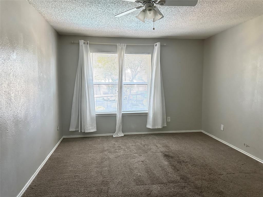 8109 Skillman Street, Unit 2007 Dallas, TX 75231 - Photo 16 of 25 an empty room with a window