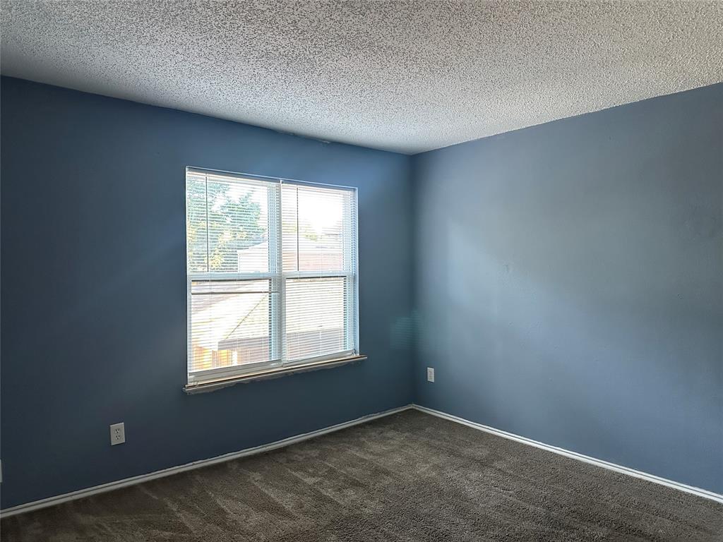 8109 Skillman Street, Unit 2007 Dallas, TX 75231 - Photo 4 of 25 an empty room with a window