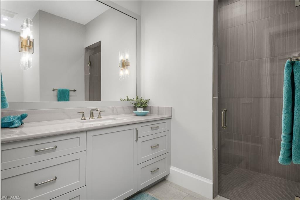18410 Blue Eye Loop Fort Myers, FL 33913 - Photo 30 of 49 Guest ensuite bath with walk-in shower.