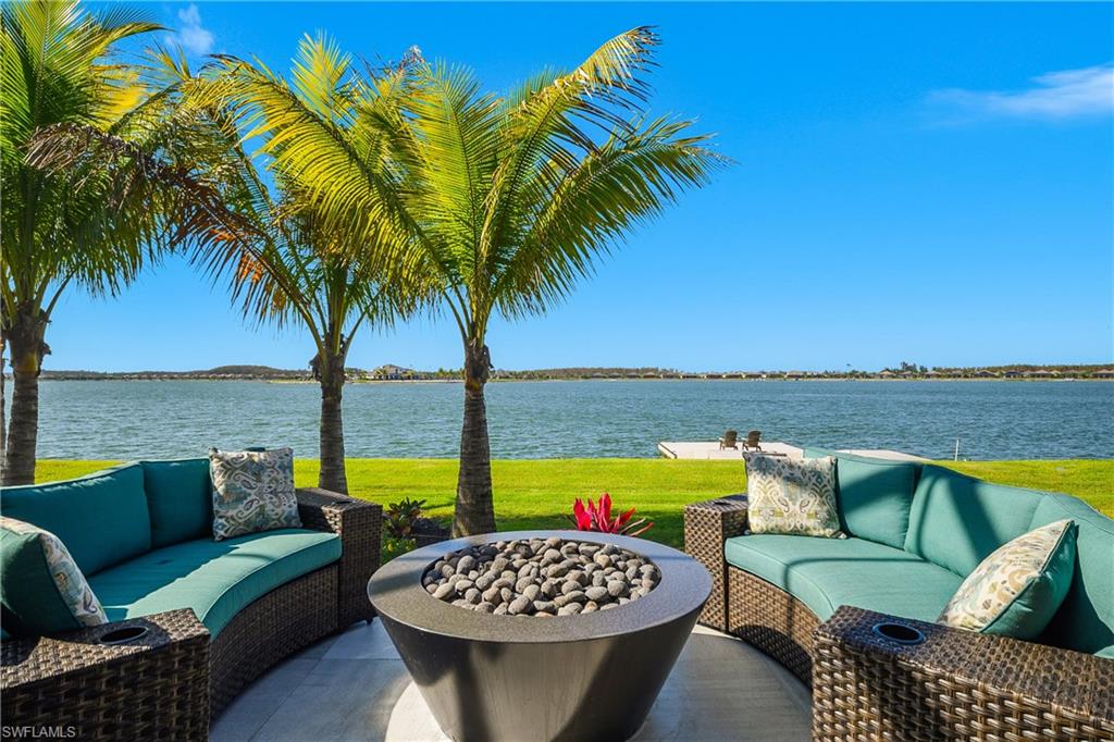 18410 Blue Eye Loop Fort Myers, FL 33913 - Photo 45 of 49 Enjoy evening sunsets, or a cocktail under the stars while sitting fireside next to your natural gas built-in fire pit.