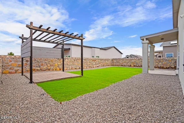 a view of a backyard with plants