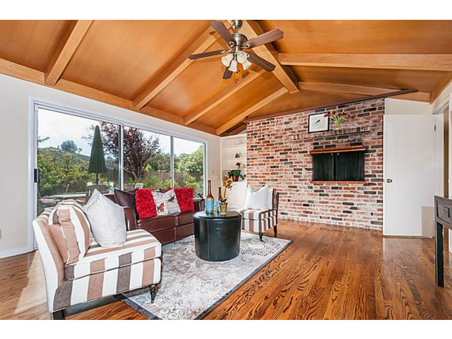 2 Rio Court Burlingame, CA 94010 - Photo 11 of 25 a living room with furniture and a flat screen tv
