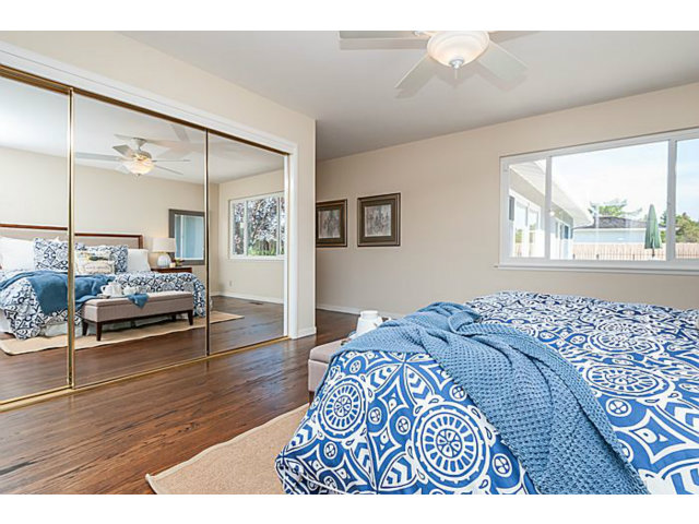 2 Rio Court Burlingame, CA 94010 - Photo 15 of 25 a bedroom with a bed and wooden floor