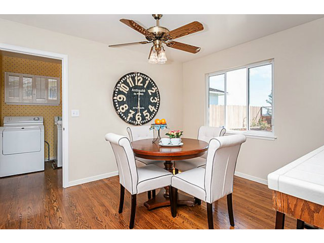 2 Rio Court Burlingame, CA 94010 - Photo 10 of 25 a dining room with furniture a rug and a large window