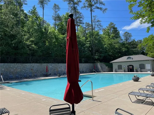 a view of house with a iron gate