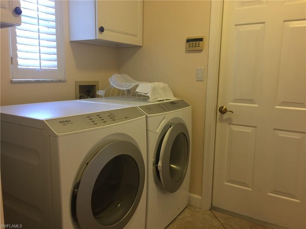 3079 Round Table Court Naples, FL 34112 - Photo 11 of 19 Laundry Room