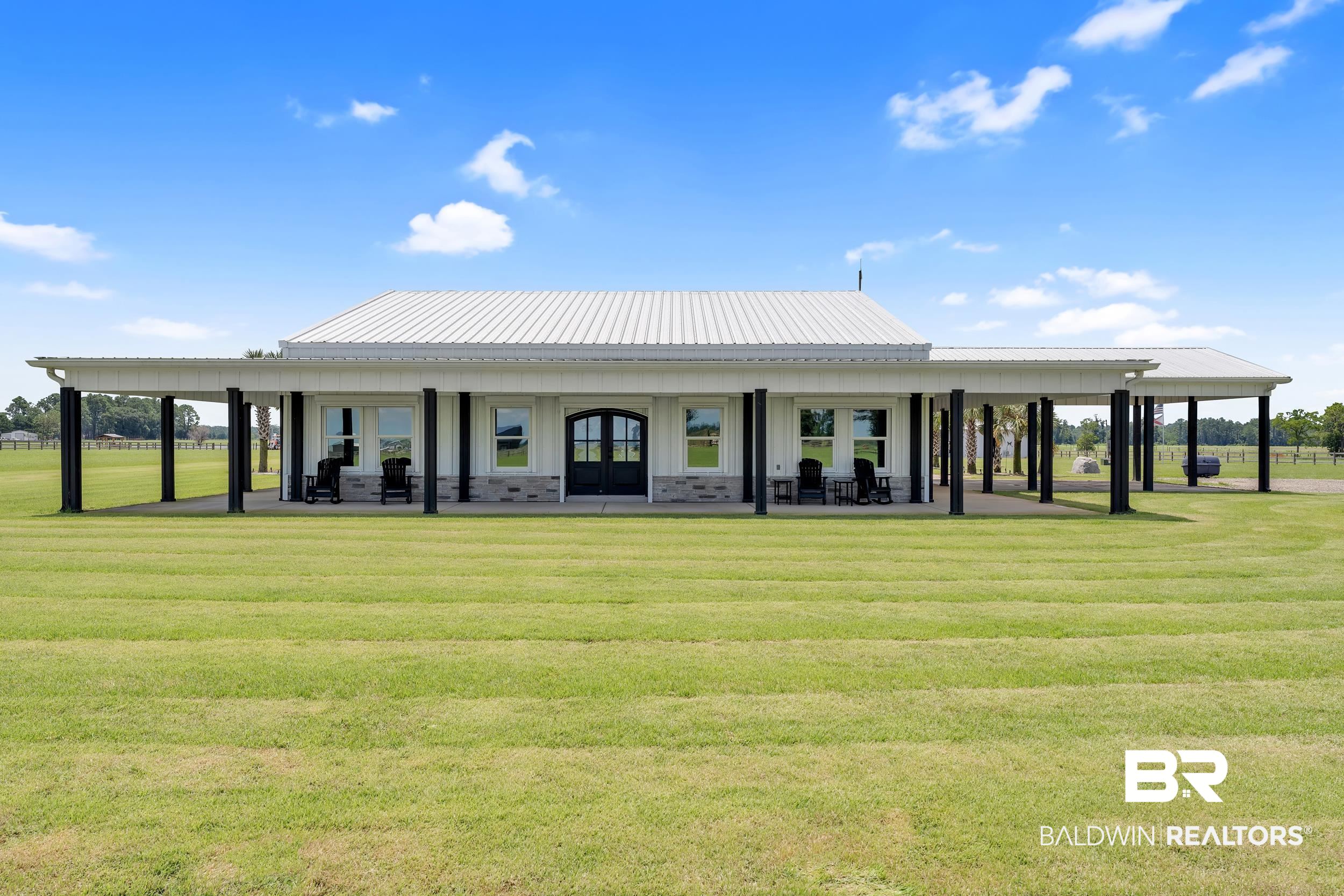 22592 Pastoral Lane Foley, AL 36535 - Photo 1 of 45 View of home's community featuring a lawn