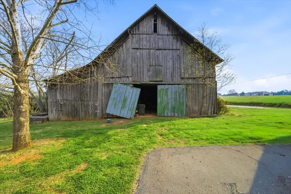 a view of a back yard of the house