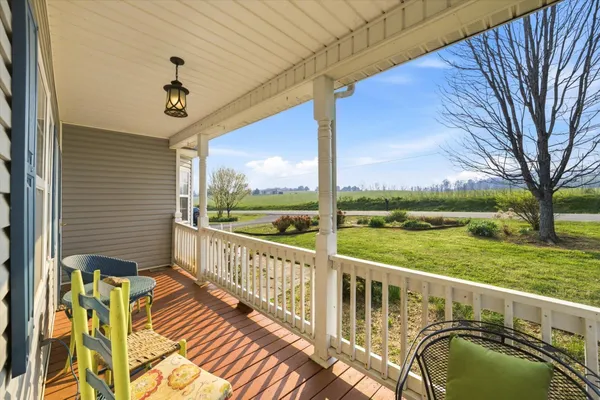 a view of a balcony with lake view