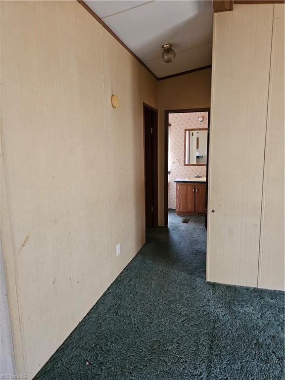 353 Mullins Road Reidsville, NC 27320 - Photo 7 of 15 hallway that has a bedroom on each side and bathroom straight ahead