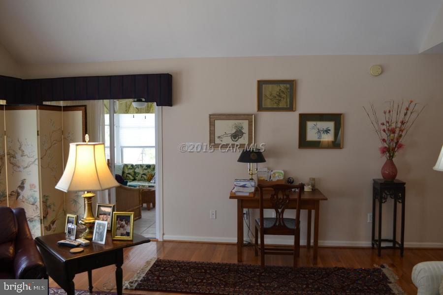 265 Windjammer Road Berlin, MD 21811 - Photo 8 of 26 a living room with furniture and a window
