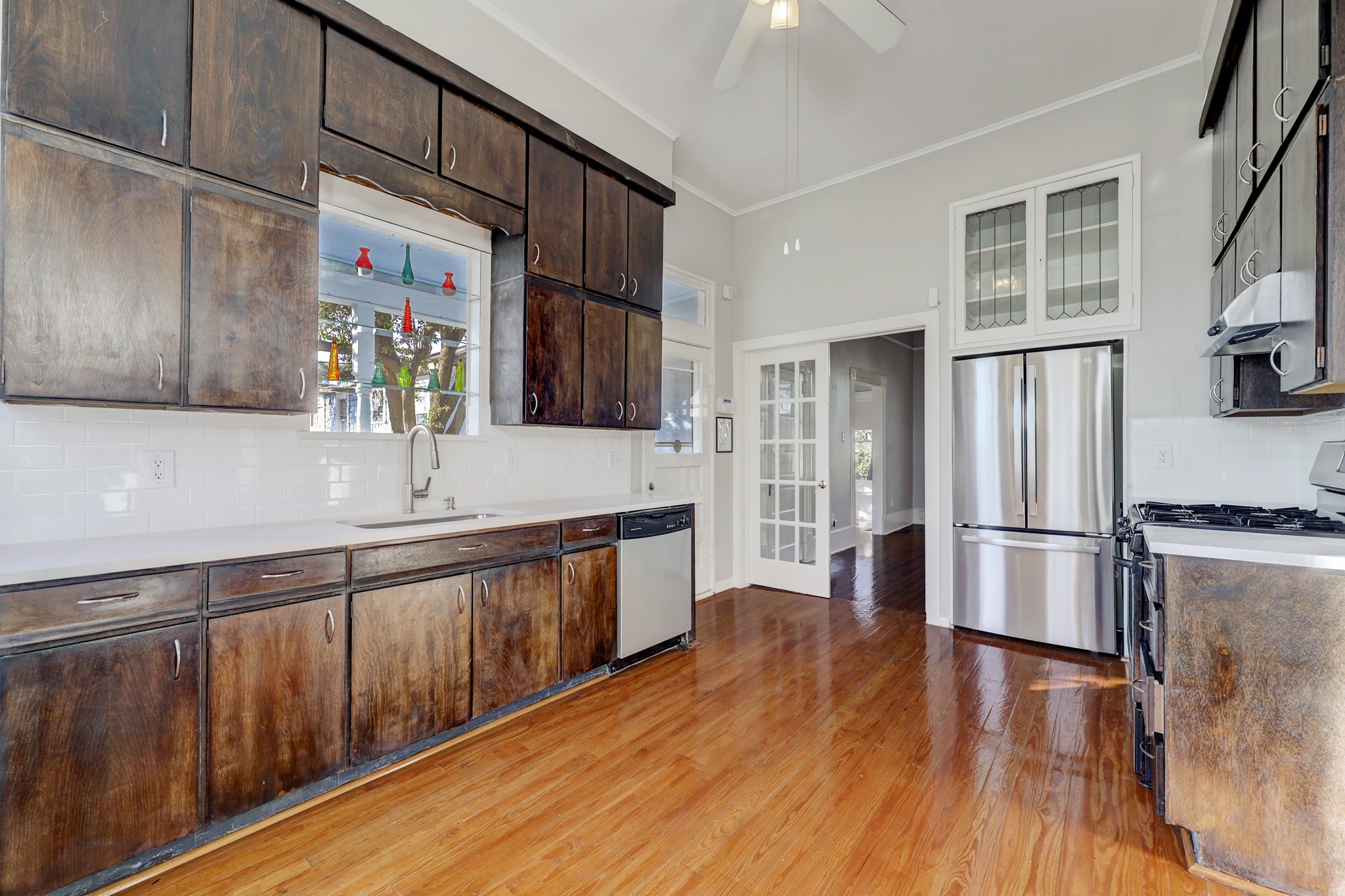 1229 Heights Boulevard Houston, TX 77008 - Photo 12 of 30 a kitchen with stainless steel appliances a refrigerator and a sink