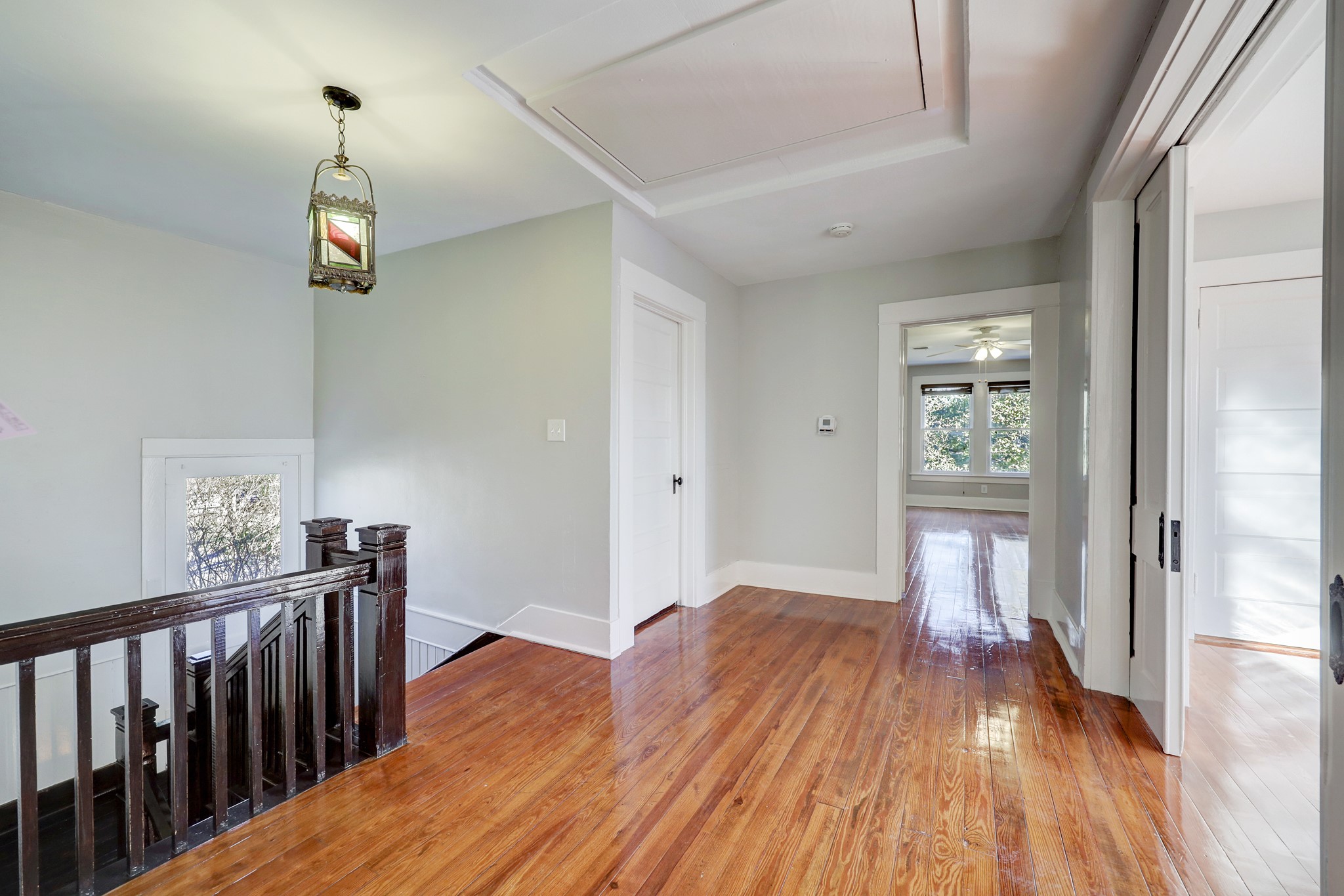 1229 Heights Boulevard Houston, TX 77008 - Photo 19 of 30 a view of hallway with wooden floor