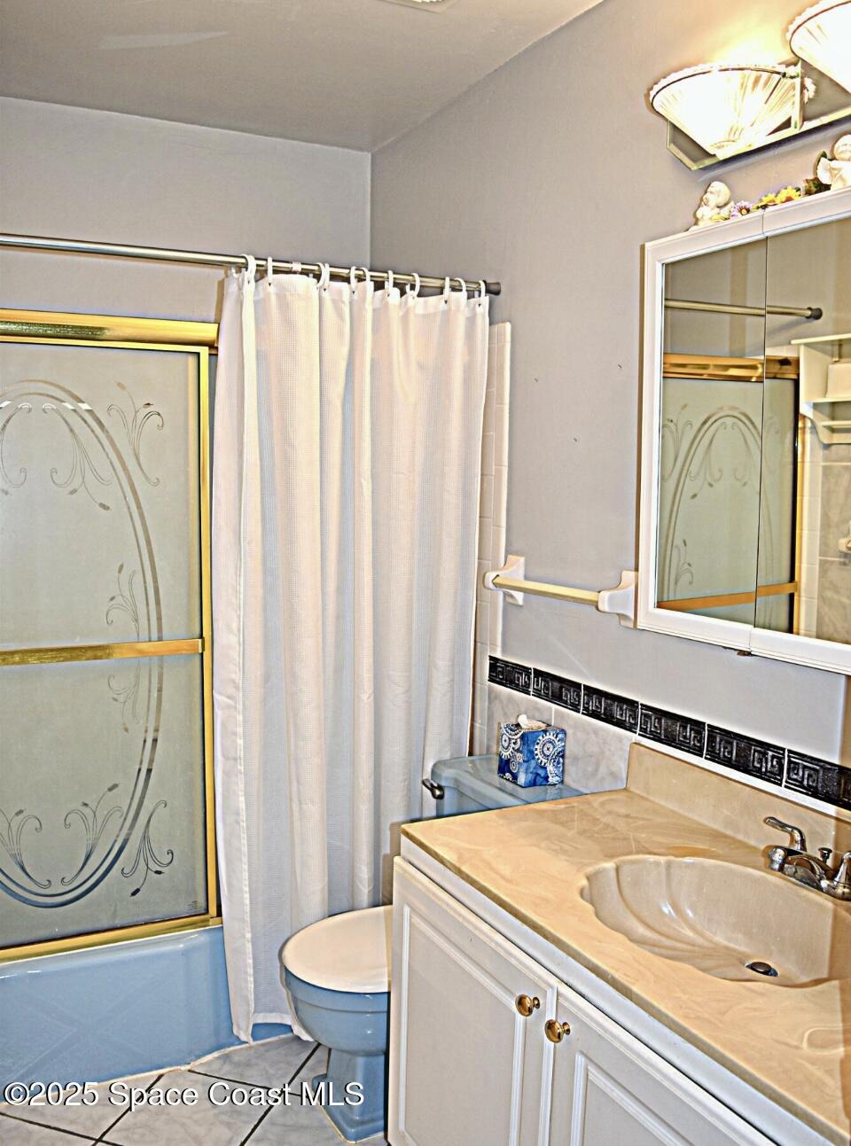 918 Jamestown Avenue, Unit 89 Indian Harbour Beach, FL 32937 - Photo 18 of 25 a bathroom with a sink and a mirror