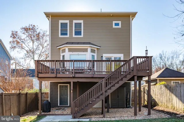 a view of a house with iron stairs