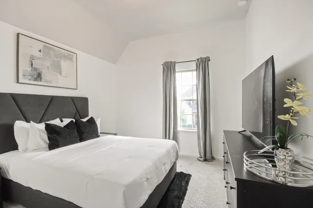 a bathroom with a sink a toilet and bathtub