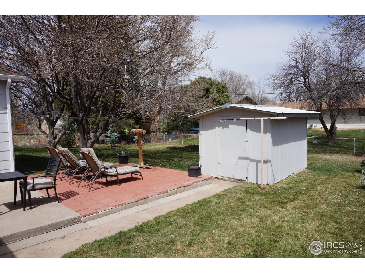 424 East Drake Road Fort Collins, CO 80525 - Photo 30 of 36 Fenced Yard with Sprinklers