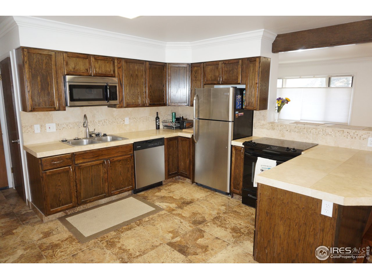 424 East Drake Road Fort Collins, CO 80525 - Photo 9 of 36 Tile Flooring in Kitchen