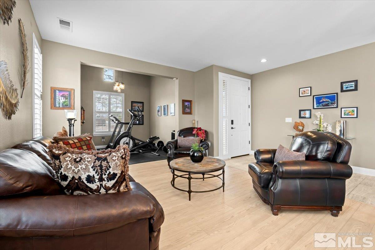 630 Equine Court Reno, NV 89521 - Photo 8 of 40 a living room with furniture and a mirror