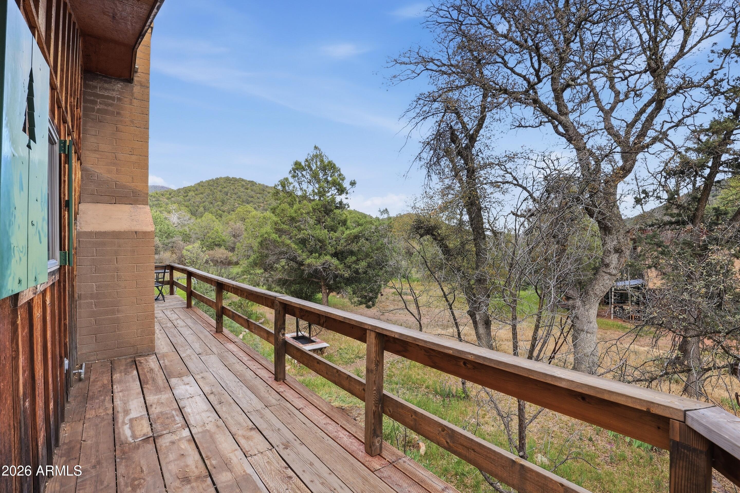 8135 West Gibson Ranch Road Payson, AZ 85541 - Photo 22 of 43 a view of balcony with wooden floor and fence