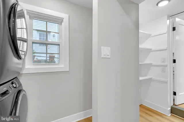 a view of front door with wooden floor