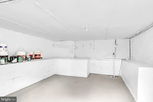 a view of a storage & utility room with closet