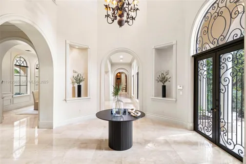 a view of a hallway with windows