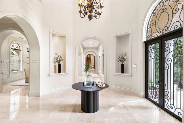 a view of a hallway with windows