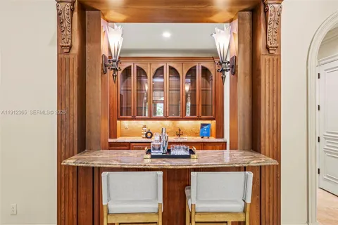 a kitchen with a sink and a refrigerator