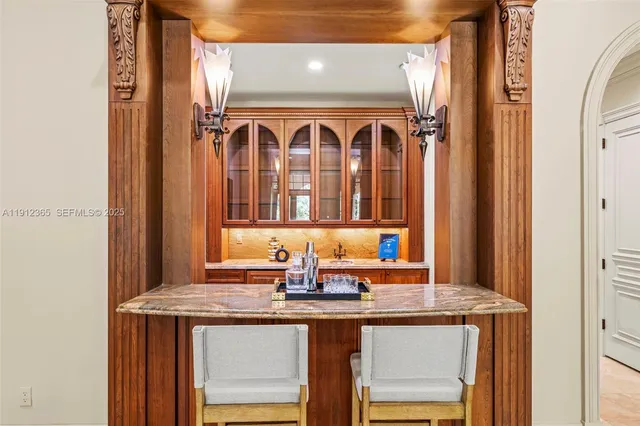 a kitchen with a sink and a refrigerator